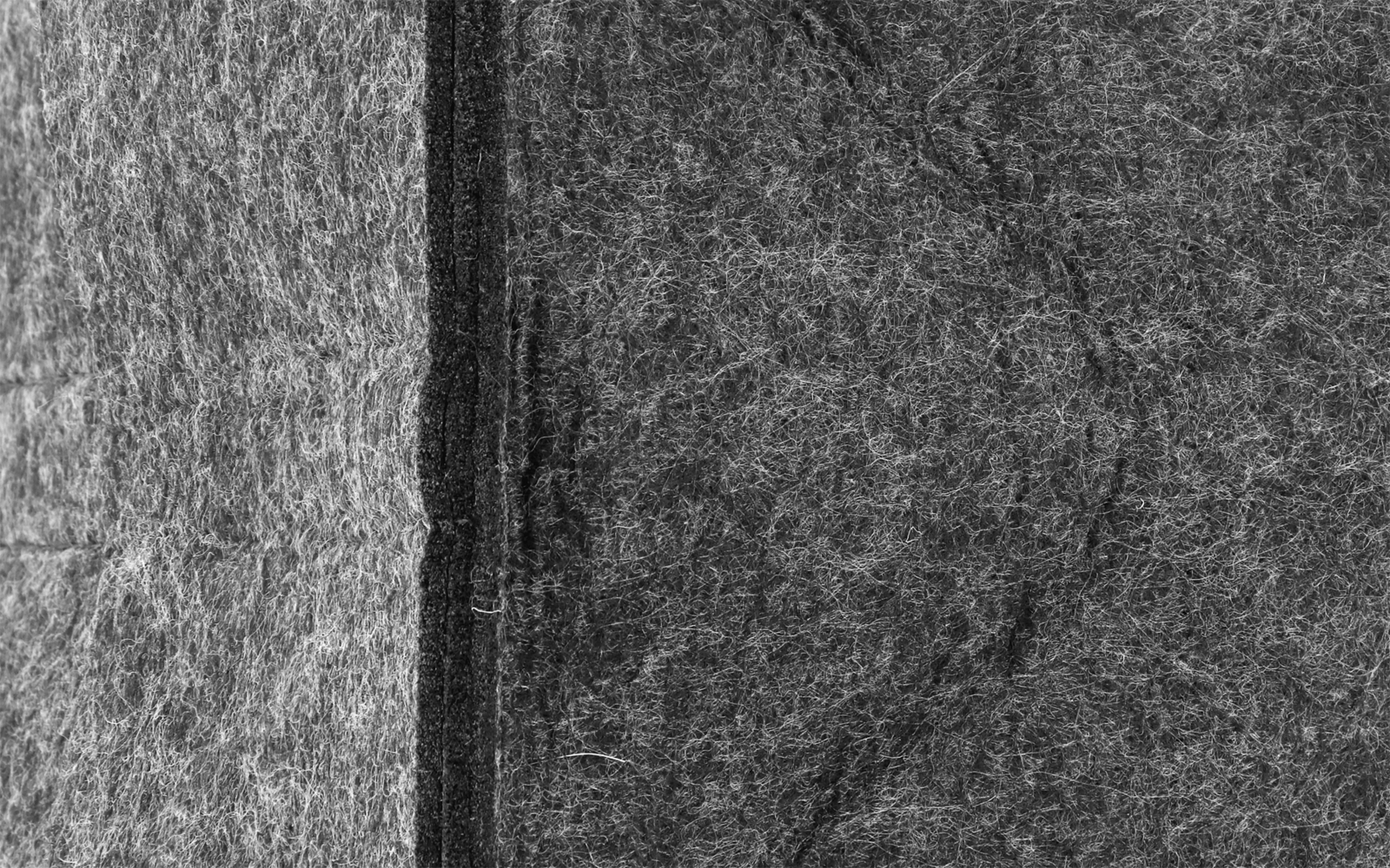 Nærbilde av materiale på Filtorganiser for tallerkener opptil 8 stk til bobil