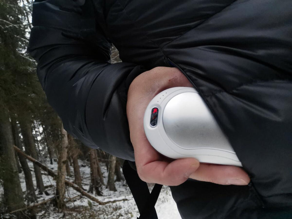 Nærbilde av LED-lys på Håndvarmer med powerbank 10000mAh LED-lys og massasje