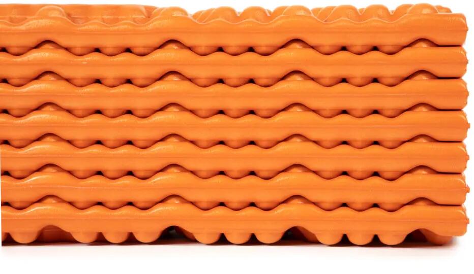 Detalj av skumcellemønster på Liggeunderlag Switchback skumcelle R2, oransje