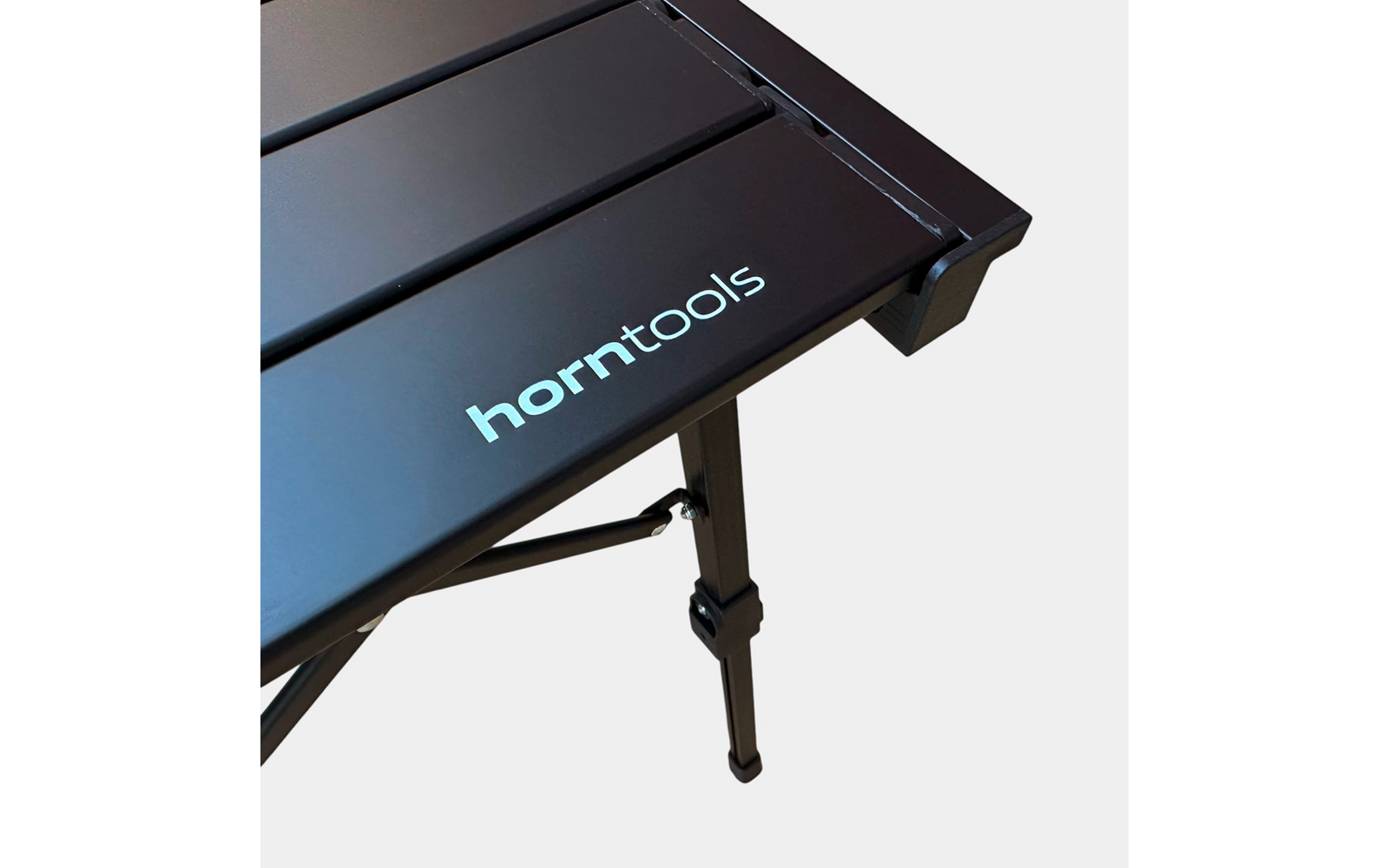 Sammenleggbart campingbord 89x60 cm høydejusterbart aluminium - Horntools nærbilde av benjustering