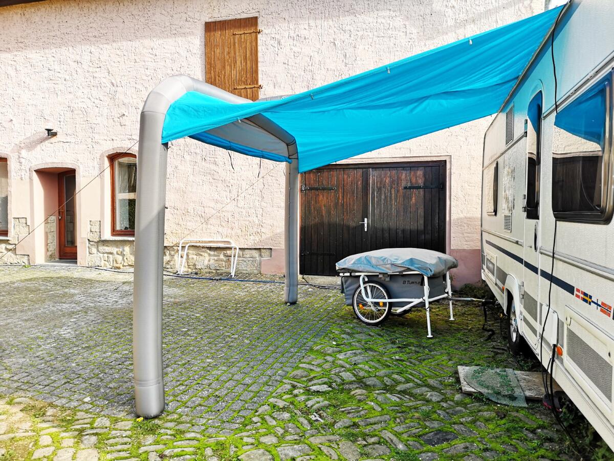 Solseil for campingvogn oppblåsbart blått Gentle Tent bakside