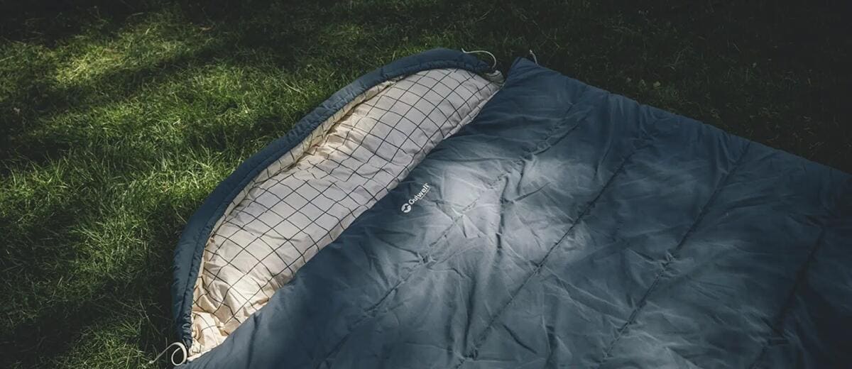 Sovepose Camper Lux Double 235x150 cm blå sammenpakket i pakkpose